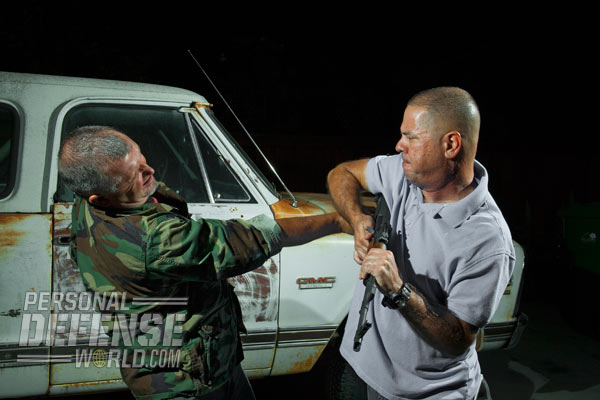 Thrust with the muzzle of the weapon to create distance.
