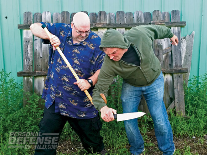 walking cane, cane, walking cane self defense, cane self defense, less-lethal weapon, less-lethal, less lethal, walking cane defense