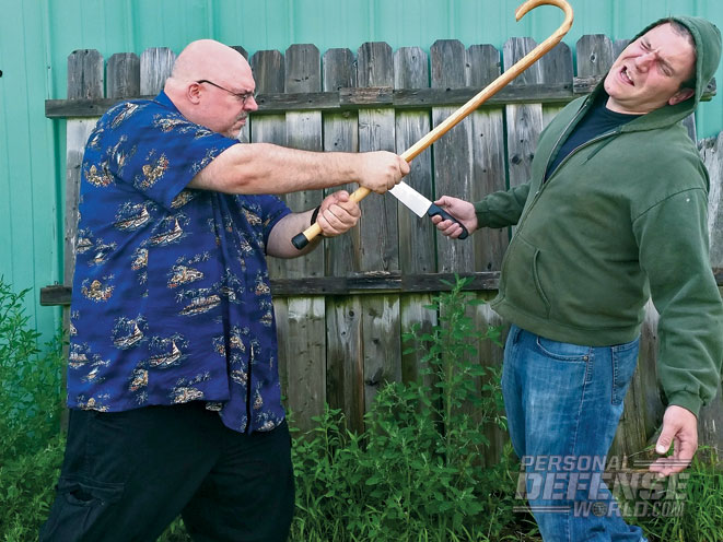 walking cane, cane, walking cane self defense, cane self defense, less-lethal weapon, less-lethal, less lethal, walking cane defense