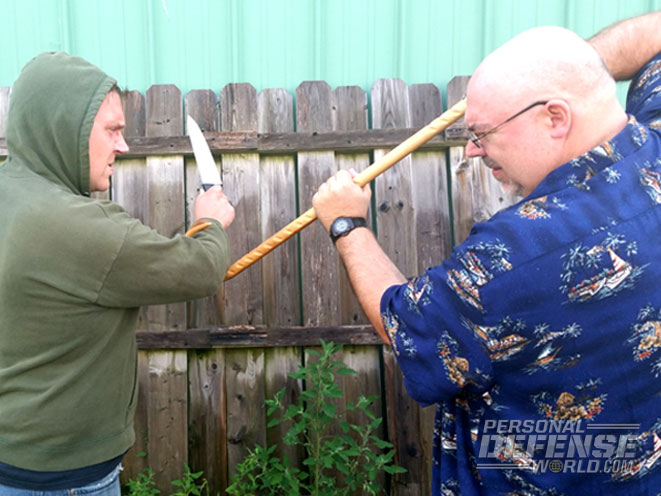 walking cane, cane, walking cane self defense, cane self defense, less-lethal weapon, less-lethal, less lethal, walking cane defense