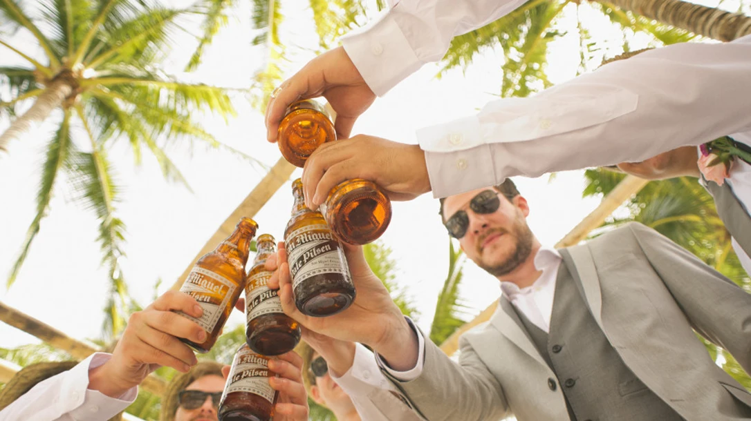 Toast the groom with one for the road for old times sake.