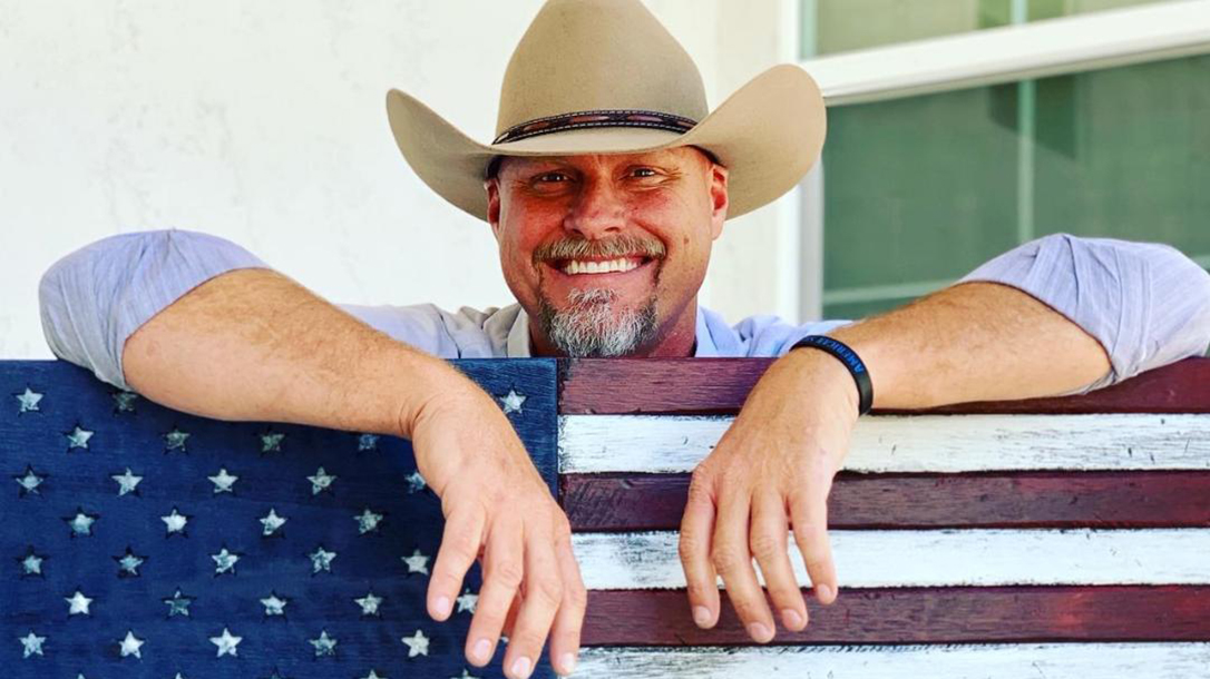 Sheriff Mark Lamb and an American flag in Pinal County, AZ