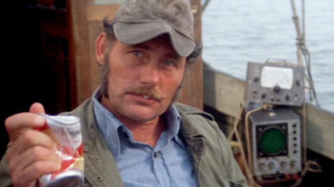 Crushing a beer is a sign of strength, demonstrated by Quint in Jaws!