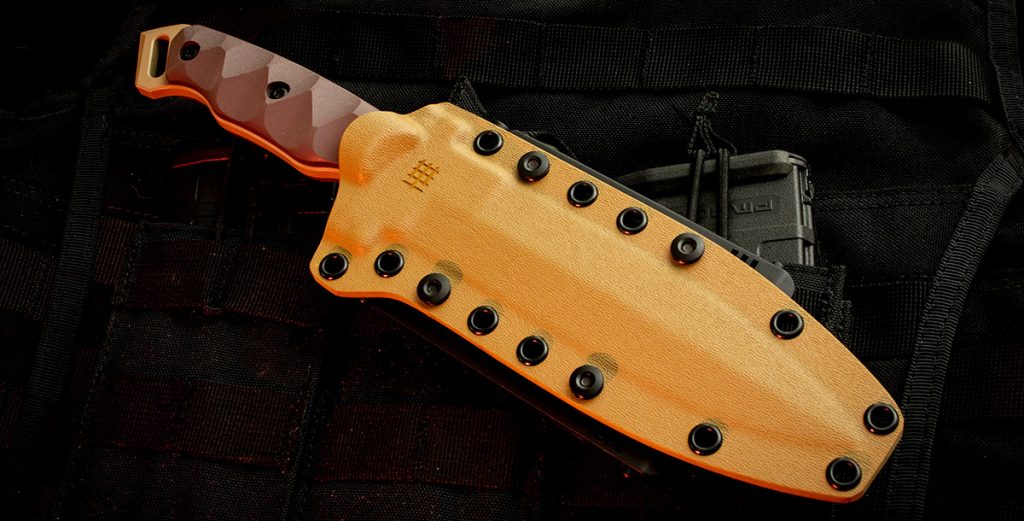 The heavy-duty pancake style Kydex sheath is as tough as the knife itself and holds the MIK-01PS solidly in place.