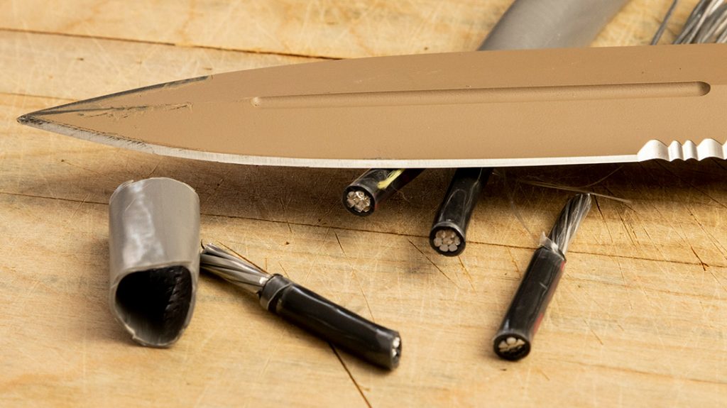 After batoning the MIK-01PS through this heavy-duty industrial power cable, there were no signs of deformation to the combative edge.