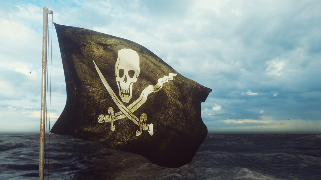Real life pirates with their Jolly Roger flag!