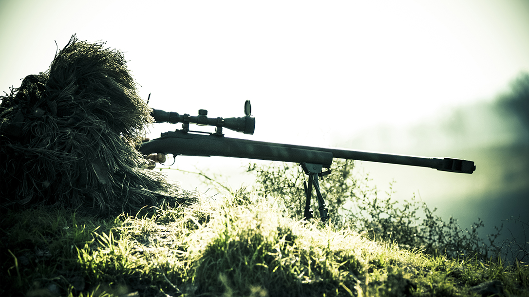 A sniper taking aim.
