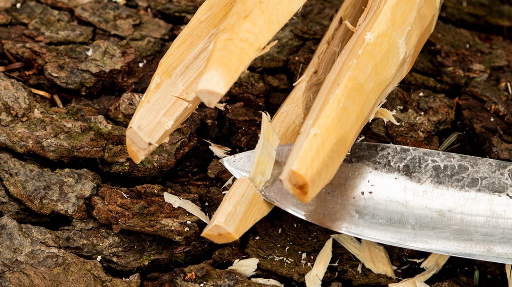 Carefully start whittling the barb. Don’t be in a hurry on this part or you could slip and accidentally cut off the barb.