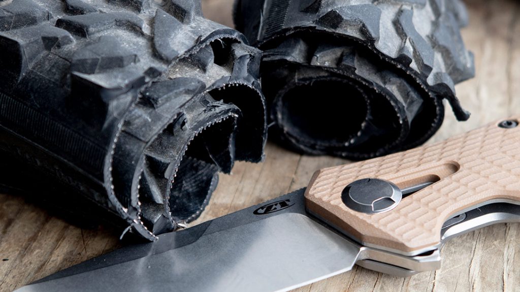 The 0308 had no issues slicing through three layers of mountain bike tire. There was no effect to the edge in any discernible way.