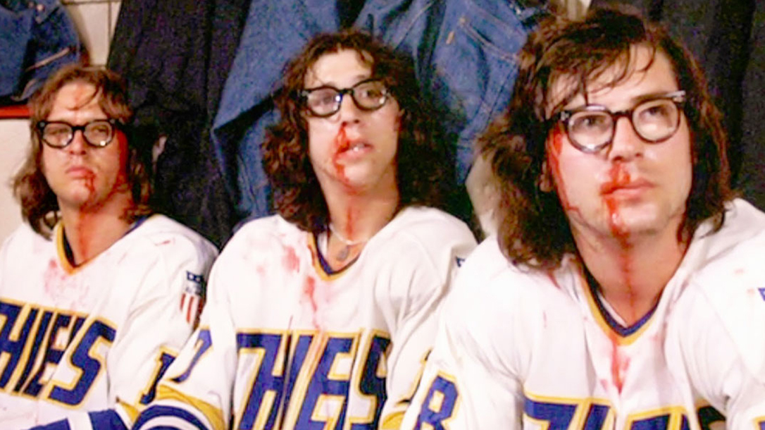 Hanson brothers from Slap Shot in the penalty box after fighting!
