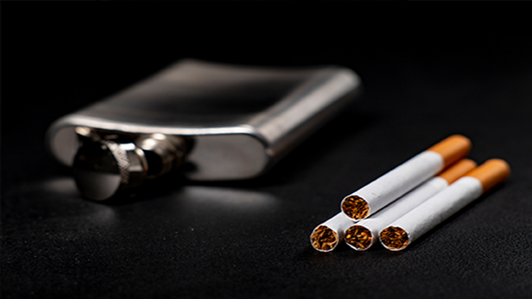In times of uncertainty, alcohol and smokes are familiar friends to ease the mind.