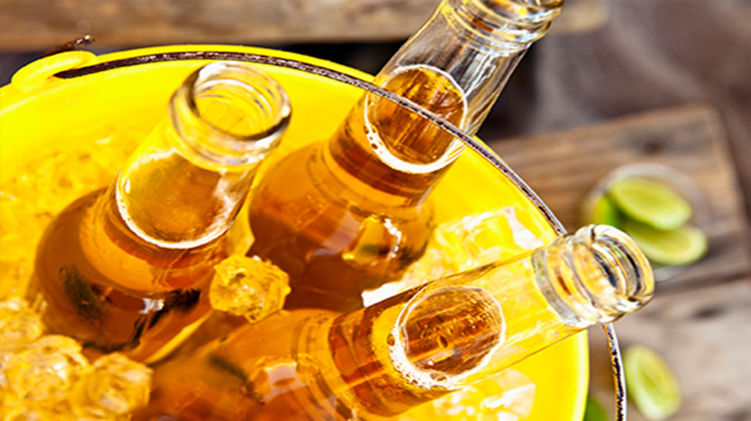 Mexican beer served with limes in a bucket of ice, is a perfect way to celebrate Cinco De Mayo.