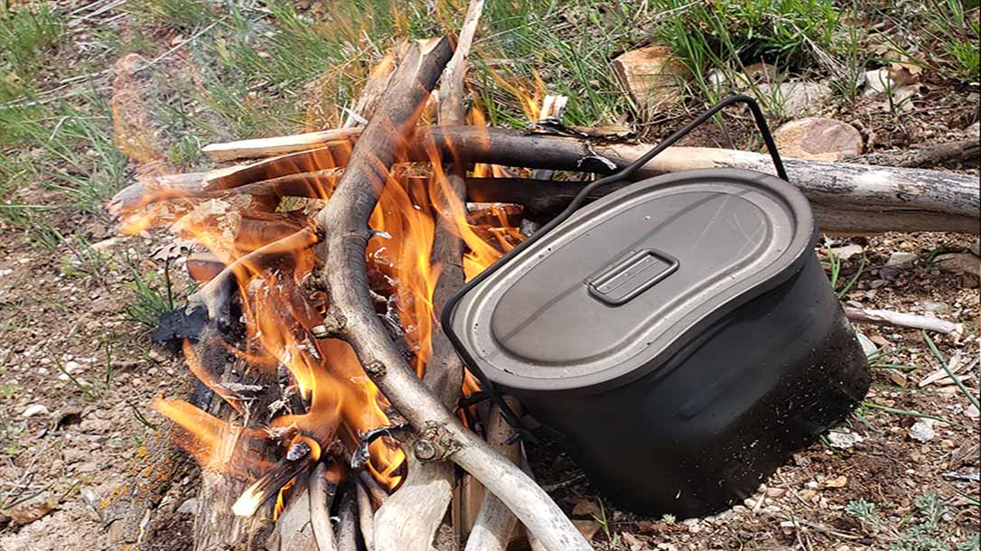 Boi;ing your water over a campfire is survival skills 101.