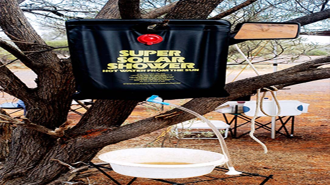 A camp shower can be as simple as hangin a bag from a tree.