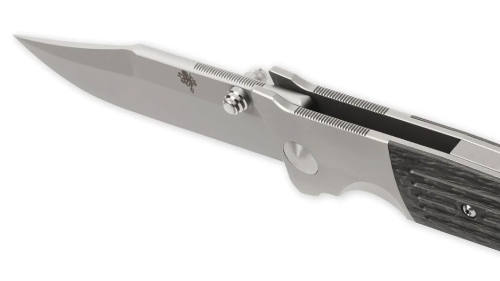 The Prometheus Design Werx SPD STS features a rounded spine for comfort, with subtle, tight jimping for retention.