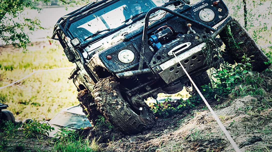 A vehicle EDC kit contains things, like road flares, flashlights, and yes even a winch to aid in getting the vehicle unstuck.
