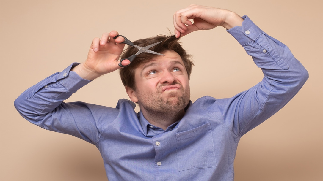 Learn how to cut your own hair and save that money for more important things, like ammo.