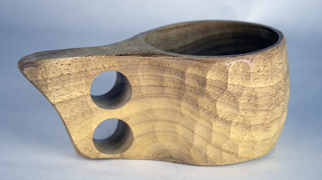 The Uberleben Kuksa handcrafted bushcraft cup makes an interesting field piece, yet functional.