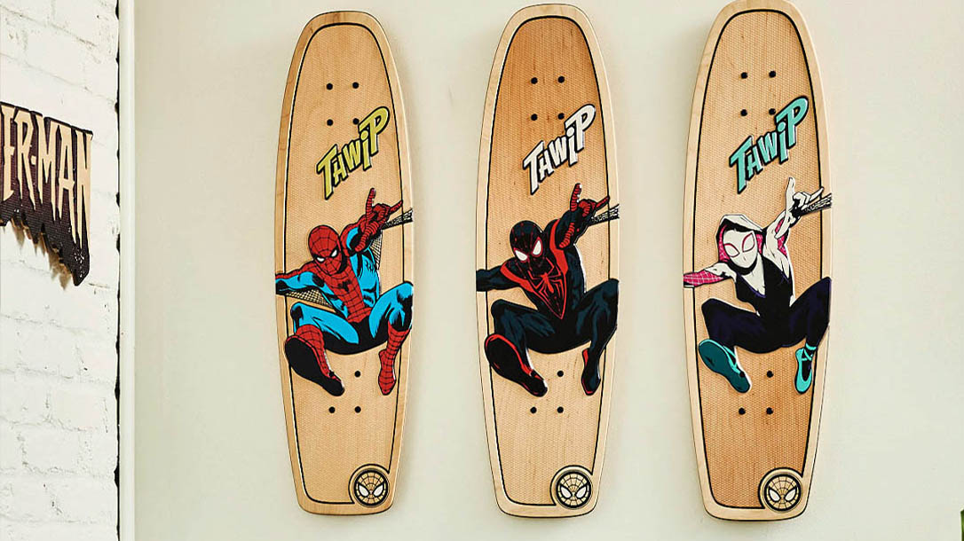 The woodworker carves unique intricate designs on the top of the board.