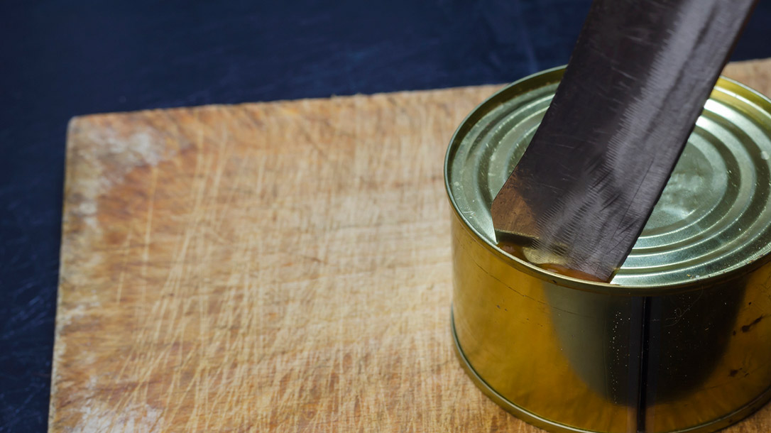 A fixed blade knife can be used effectively to open a can of food in a survival situation.
