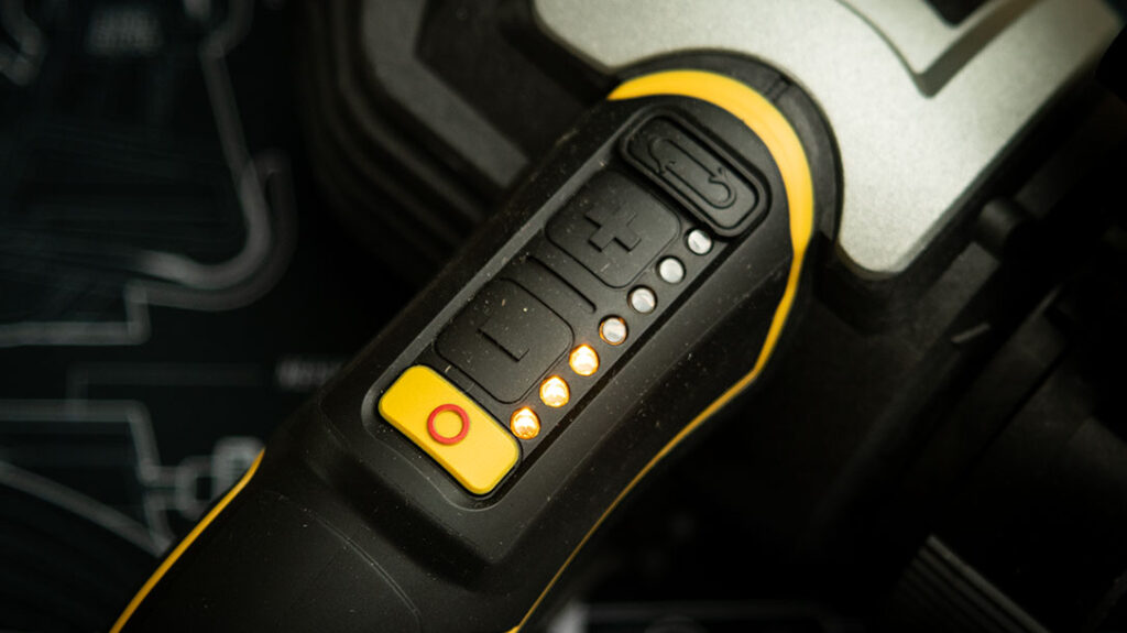 The top of the handle now houses the speed controls, continuous run button, and power button for one-handed operation.