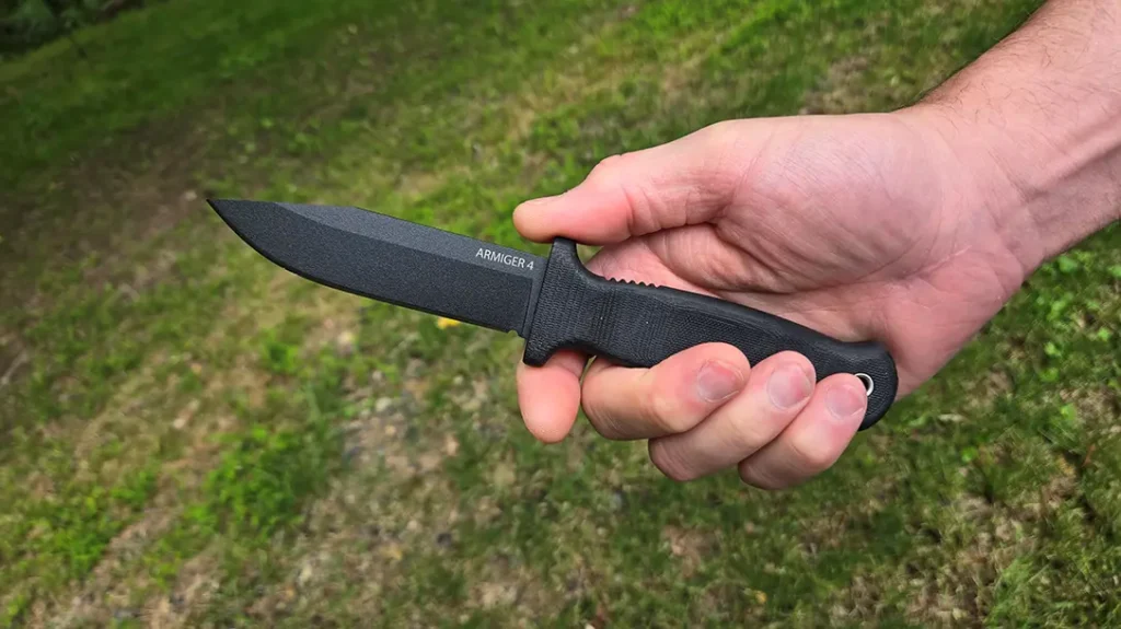 Demko Armiger 2 knife in the hand.