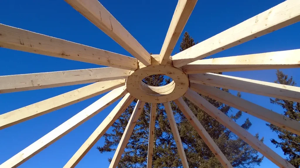 The roof of the Mongolian yurt accommodates a stove pipe.