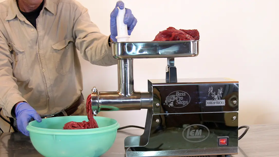 Making sausage from venison.