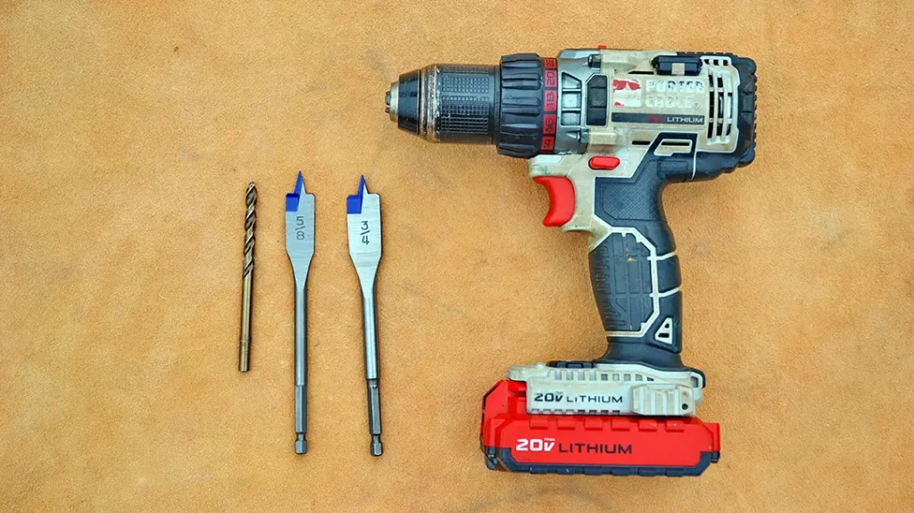 The two-bucket water filtration project requires a drill and bits