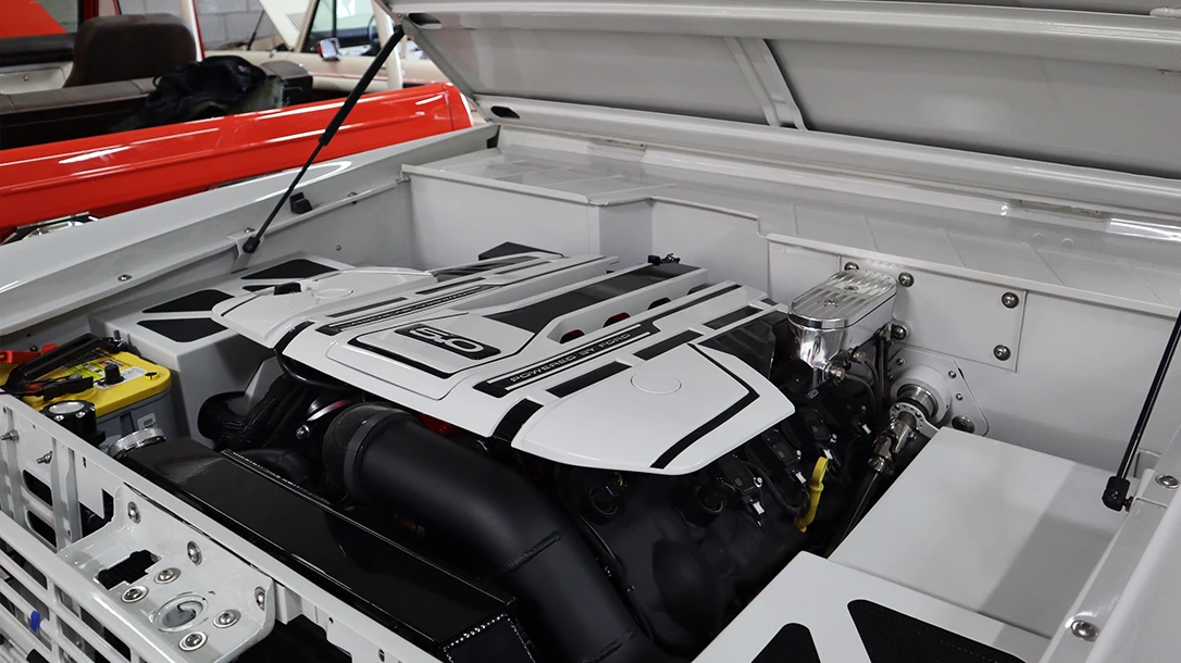 An incredible Resto mod Ford Bronco engine bay.