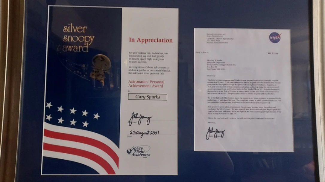 The Silver Snoopy plaque and letter presented to Gary Sparks by Astronaut John Young.