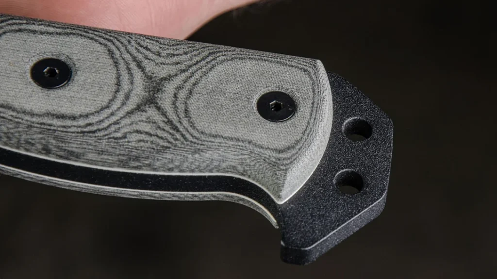 The pommel can be used for striking, and with its two pre-drilled holes, can be used for cordage attachments.