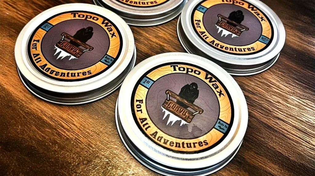 CORVUS Tool & Knife Topo Wax: a blend of beeswax, mineral oil, and fir oil. Non-toxic, food-safe, and smells like the outdoors. Keep your gear protected and adventure on.