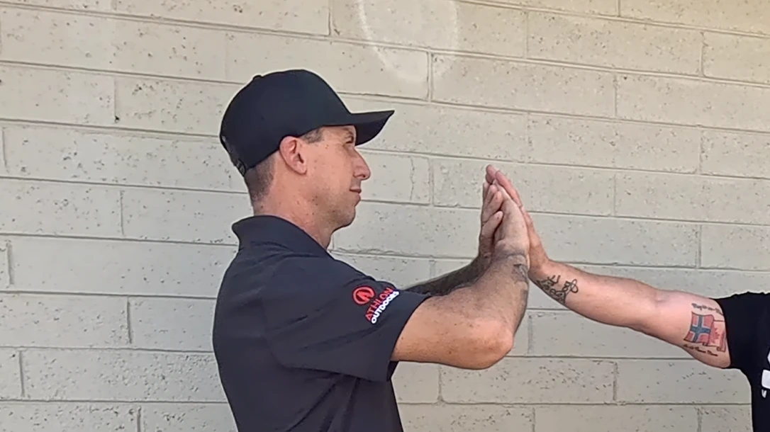Practicing how not to throw a punch.