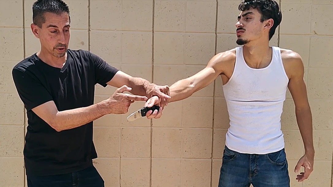Learn proper knife disarm tactics.