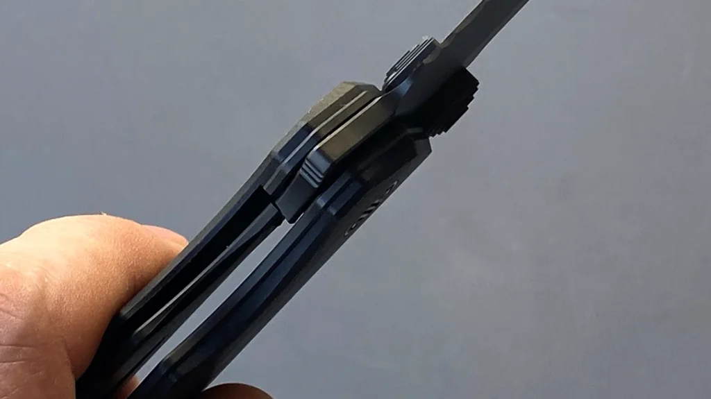 The blade is held in lockup via a liner lock.