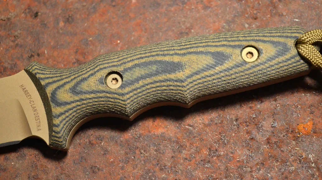 There are two finger grooves on the handle, making for a very secure and comfortable grip. This is the camo color handle option.