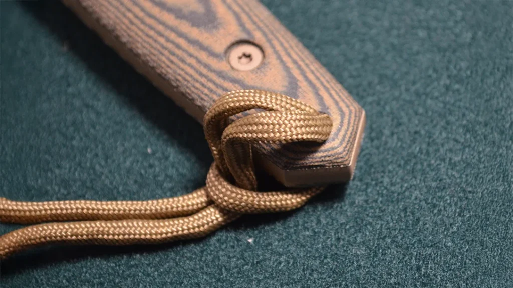 The butt of the handle has a skull-crusher style pommel.