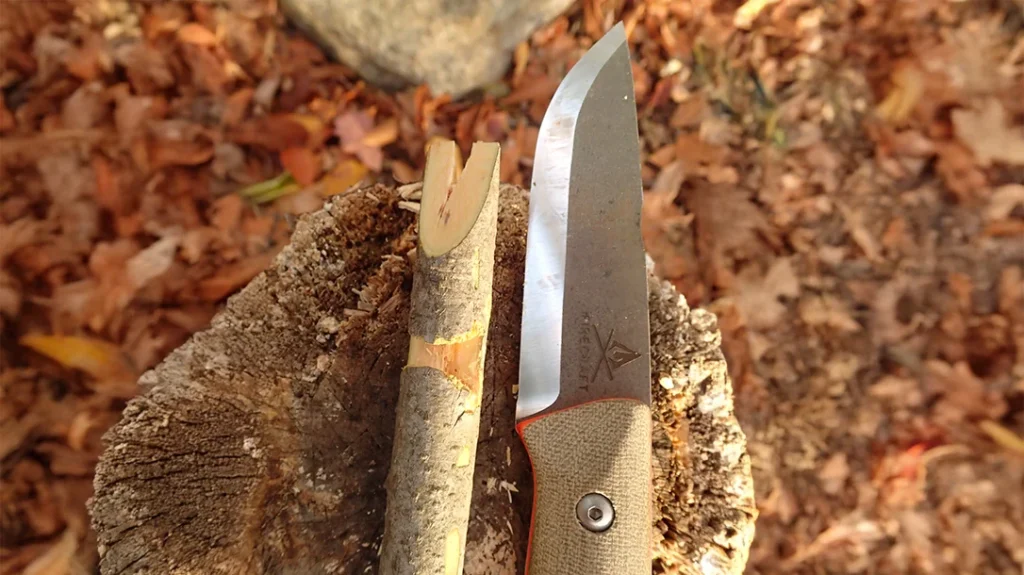 The thin, sharp edge of the White River Knife & Tool FC-PKO Puukko makes notches easily for trap parts, stakes, or a try stick.