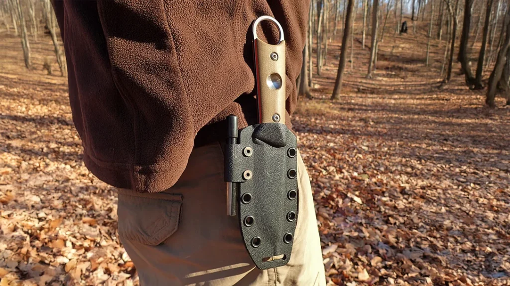 The kydex sheath rides on the high side for the author, but it’s not a rib jabber. The sheath can be adjusted and used as a neck knife with some cord.