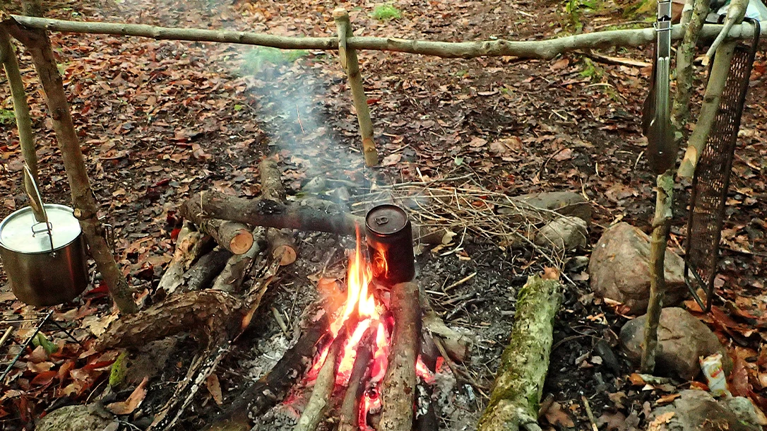 The campfire is like religion to campers. Keeping it going was a group effort with our woods associates, our tools!