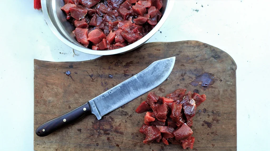 The large knife sliced large amounts of deer meat and pork shoulder for dishes and canning.