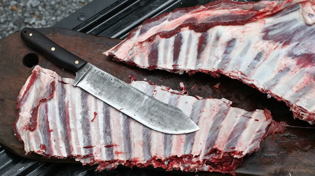 The hefty blade chopped one section of elk ribs in half without damage to the blade.