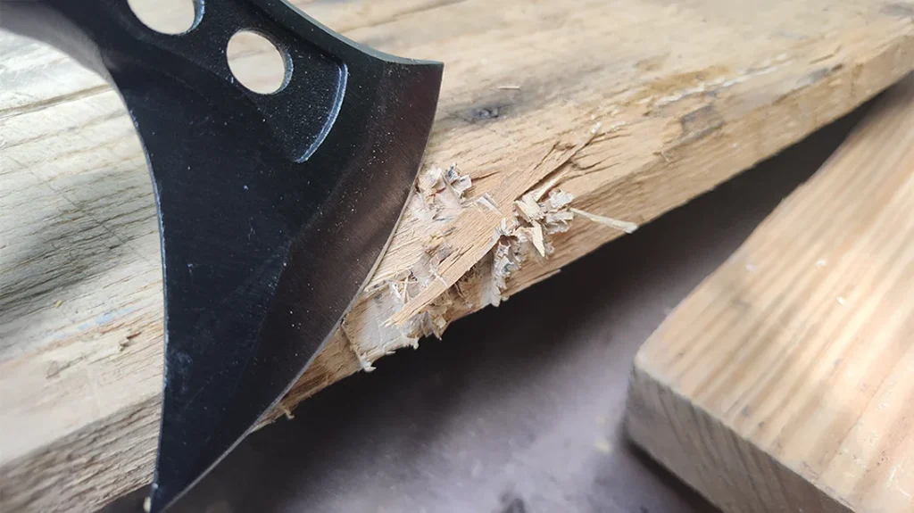 Although not near optimal sharpness, the cheap tactical tomahawk did chip away pieces of wood useful for tinder.