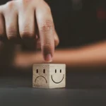 What is SAD? This condition affects millions of people each year, leading to symptoms like low mood, increased appetite, and social withdrawal.