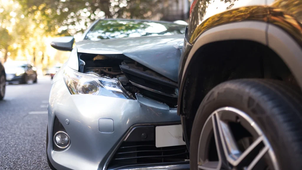 The bump from behind is a classic insurance scam.