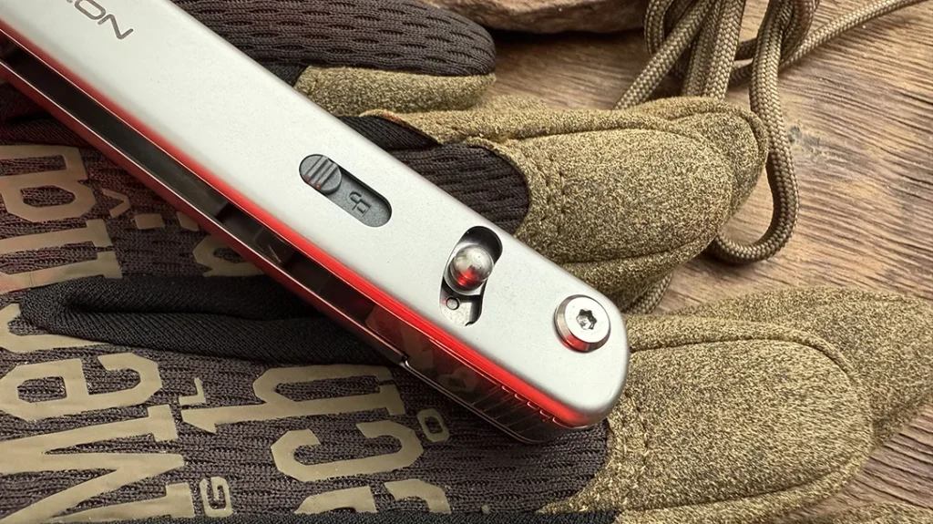 The multitool features a secondary sliding lock, ensuring that implements don’t shake loose when carried.