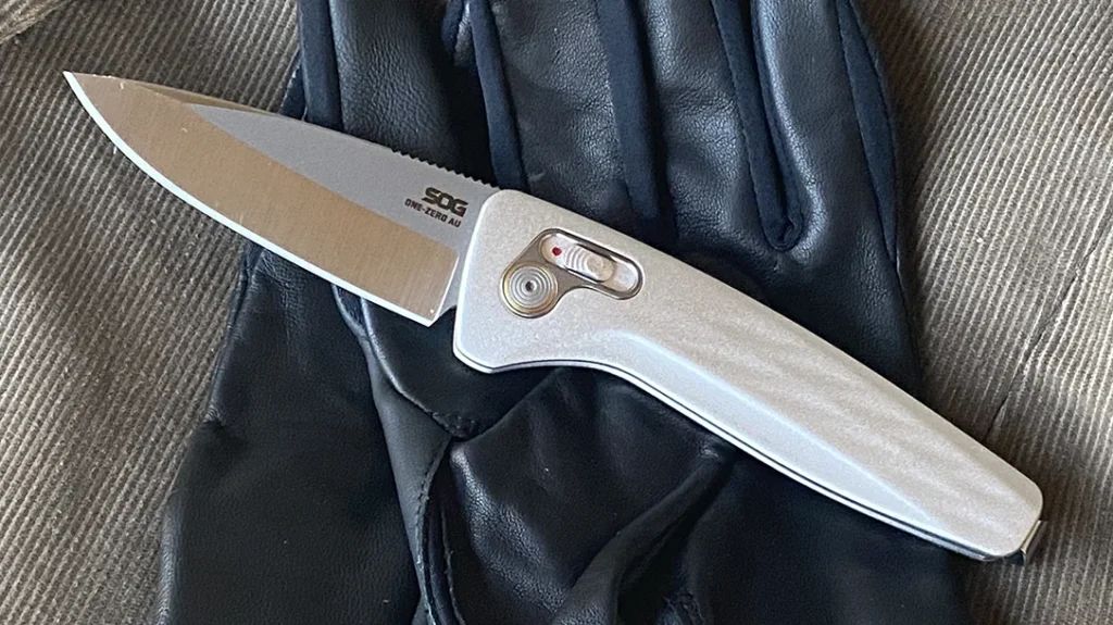 The blade’s geometry is optimized for versatility, featuring a saber grind that supports both slicing and piercing tasks.