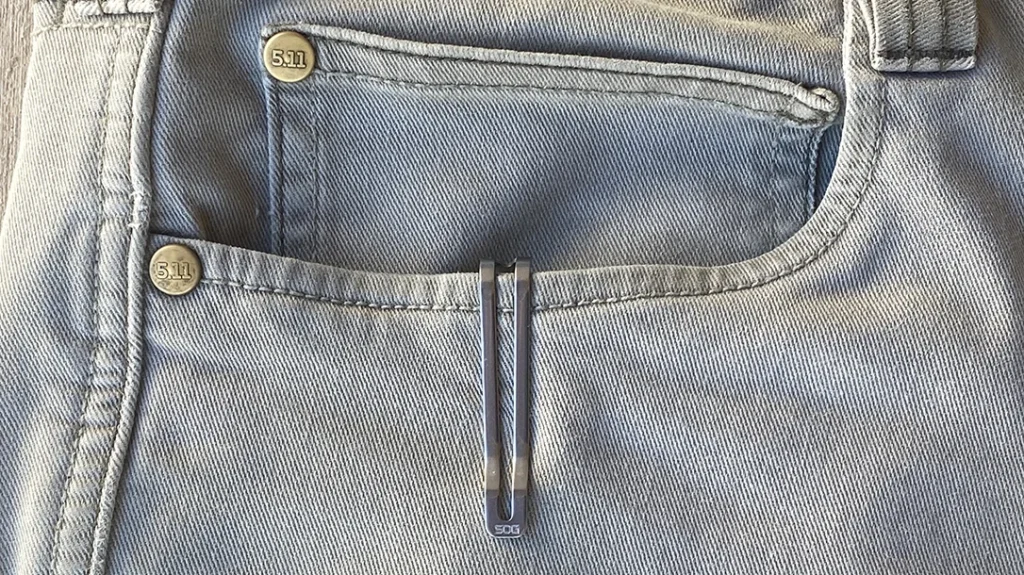 A deep-carry, loop-over pocket clip constructed from stainless steel ensures discreet placement in the pocket.