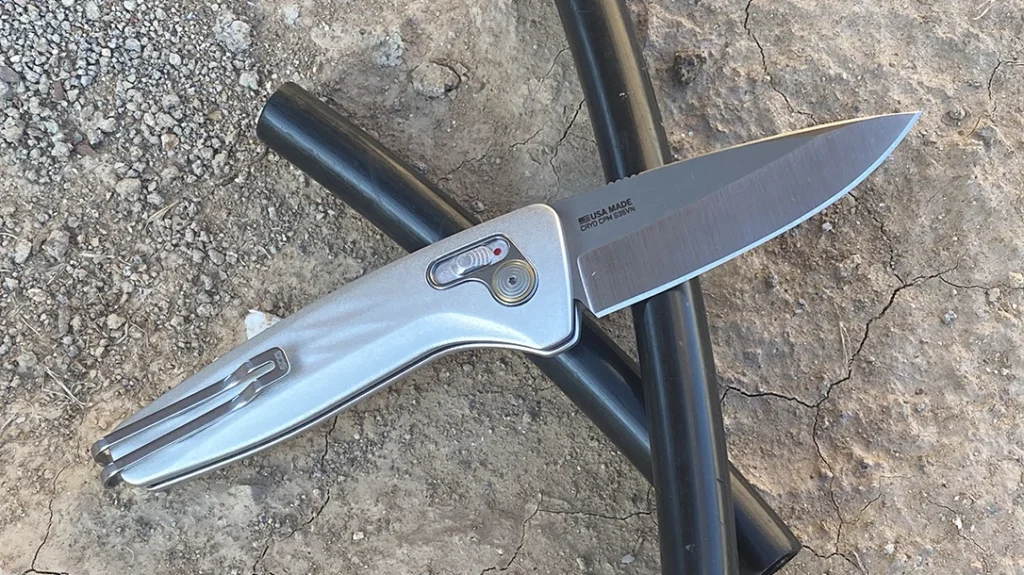 The SOG One-Zero AU Automatic Knife is a benchmark in knife design, seamlessly blending rugged functionality with refined style.